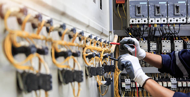 Professional Electrician technician working in Highland Village, TX